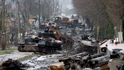 Ukraine war: Bucha street littered with burned-out tanks and corpses
